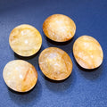 Golden Healer Quartz Palm Stone — 2.5–3 in
